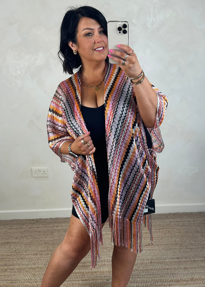 Woven throw on - oranges
