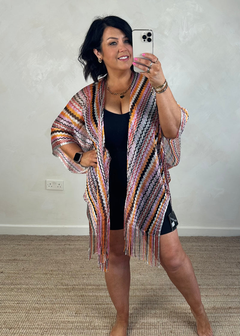Woven throw on - oranges