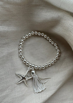 Stretch charm bracelet - big starfish tassel silver-The Style Attic
