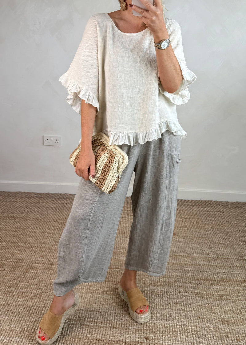 Striped woven clutch bag - beige