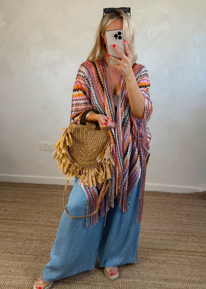 Woven throw on - oranges-The Style Attic